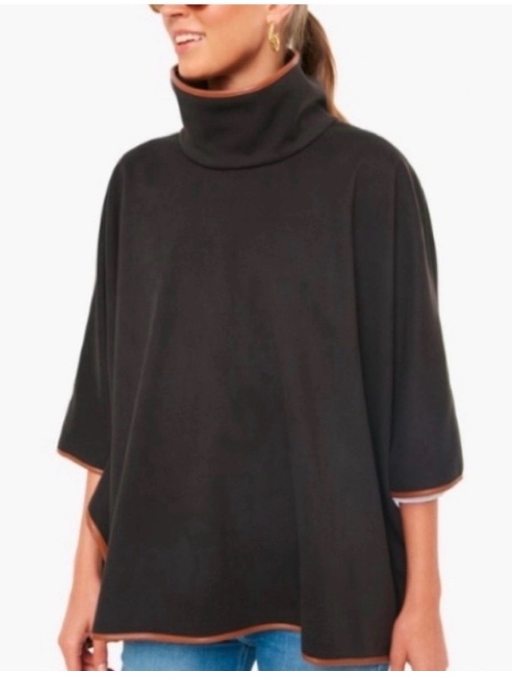 Turtleneck Piper Poncho black w brown faux leather trim.